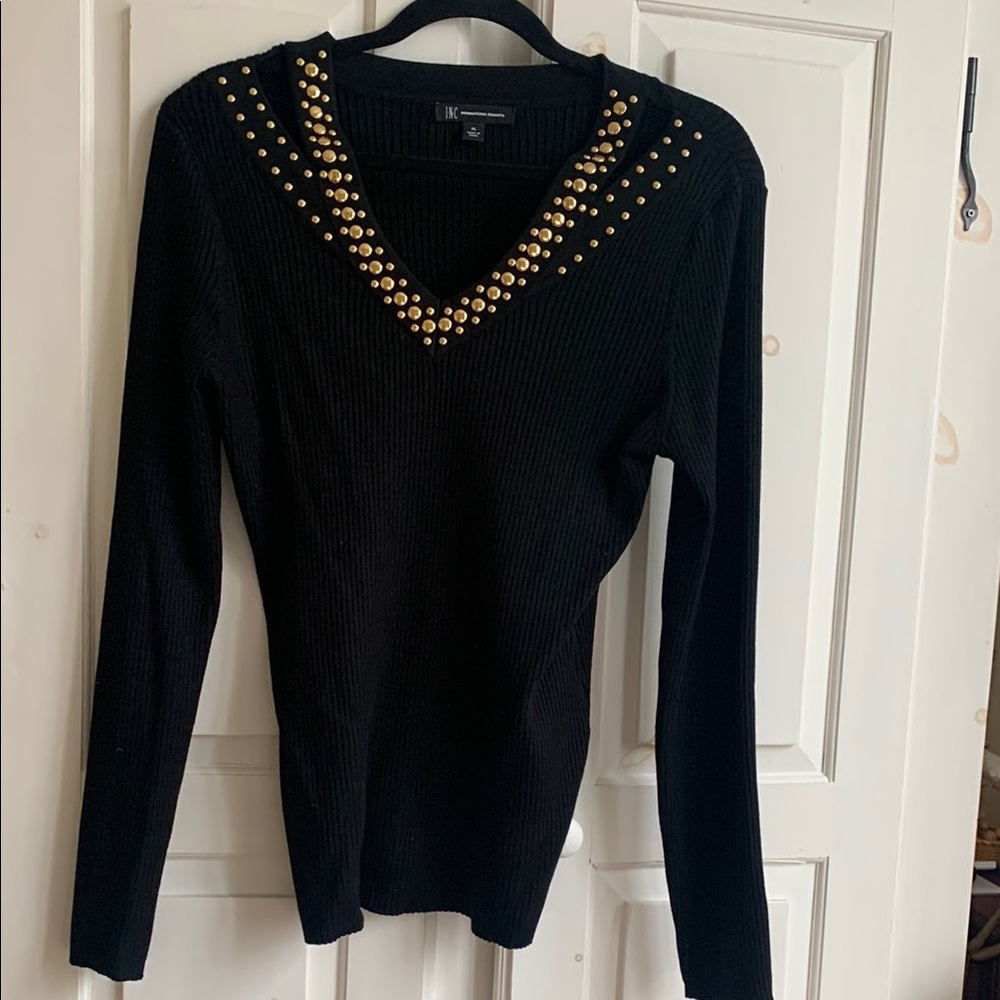 Elegant Black Sweater with Gold Accents